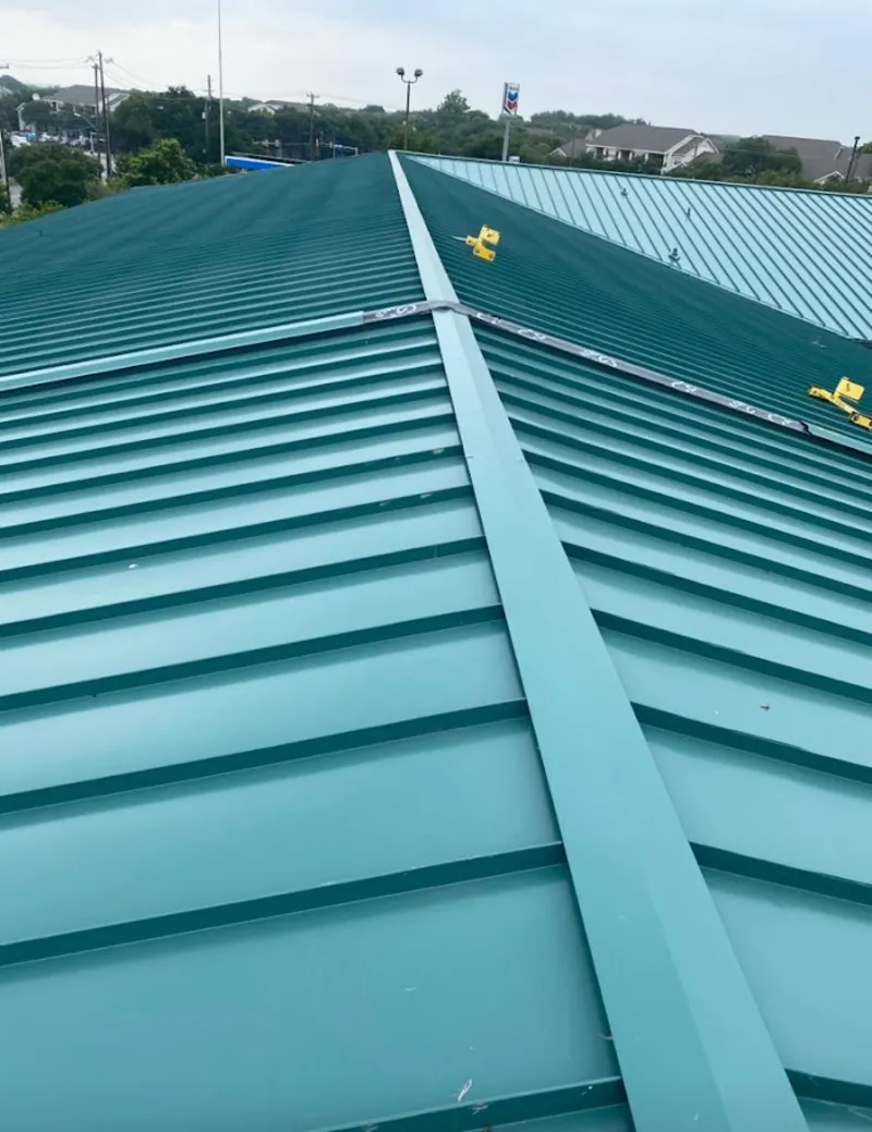Green commercial metal roof ridge and valley for Metal Roof Repair in Robinwood